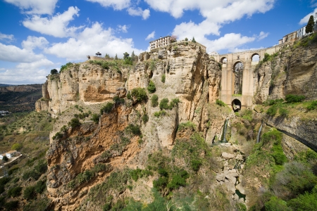 Picturesque scenery in Andalucia region of Spain, rock formation and the New Bridge in Ronda, Malaga province, Spain.の写真素材