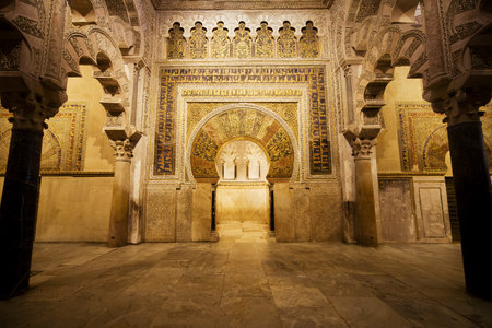 10th century horseshoe arched Mihrab in the Prayer Hall of 8th century the Great Mosque (Mezquita Cathedral) in Cordoba, Andalusia, Spain.のeditorial素材