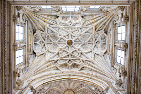 Mezquita Cathedral historic ornate ribbed vault ceiling of the transept in Cordoba, Spain.のeditorial素材