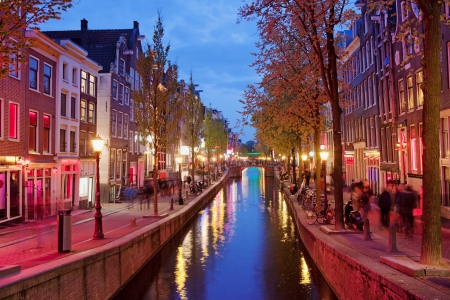 Amsterdam Red Light District area in the city centre at dusk, North Holland, the Netherlands.の写真素材