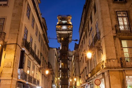 Santa Justa Lift (Portuguese: Elevador de Santa Justa) by night in Lisbon, Portugal. Famous city...