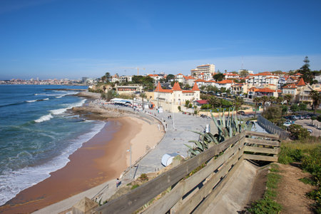 Picturesque resort town of Estoril in Portugal, beach on the Atlantic Ocean and seaside promenade.のeditorial素材