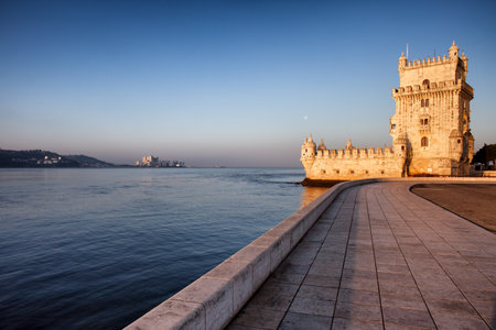 Belem Tower and promenade along Tagus river at sunrise in Lisbon, Portugal.のeditorial素材