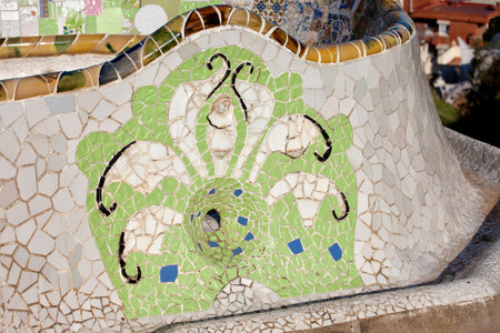 Trencadis abstract mosaic, part of Serpentine Bench at Gaudi's Park Guell in Barcelona, Catalonia, Spain.のeditorial素材