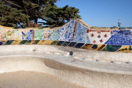 Serpentine Bench with Trencadis mosaic at Antoni Gaudi's Park Guell in Barcelona, Catalonia, Spain.のeditorial素材