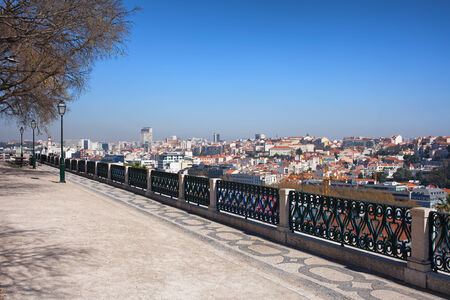 View over Lisbon from the Garden of San Pedro de Alcantara (Portuguese: Miradouro de Sao Pedro de Alcantara), Portugal.の写真素材