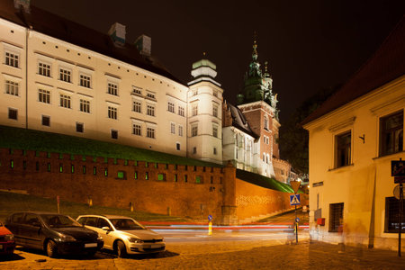 Wawel Royal Castle at night in Krakow, Poland. North facade, view from the Kanonicza street.のeditorial素材
