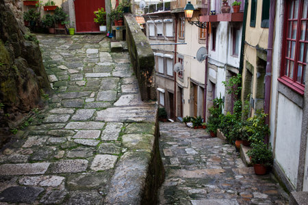 Medieval alley in Ribeira, Old Town of Porto in Portugal, historic city centre.のeditorial素材