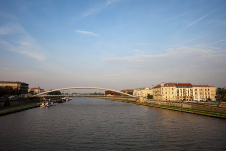 Vistula river with Father Bernatek Footbridge in Krakow, Poland.のeditorial素材