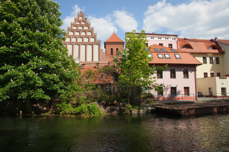 River view of the city of Bydgoszcz in Poland, Cathedral on the left.のeditorial素材