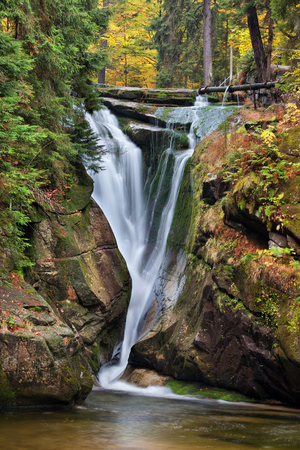 Szklarka waterfall (Polish: Wodospad Szklarki) in autumn, Karkonoski National Park, Poland.の写真素材