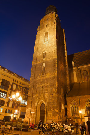 Poland, city of Wroclaw, St. Elizabeth's Church tower at night in the Old Town, 14th century Gothic architecture.のeditorial素材