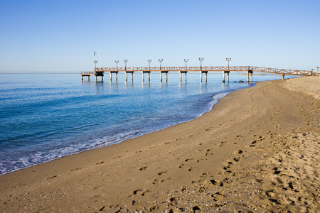 Spain, Marbella, Costa del Sol, sandy, empty beach at Mediterranean Sea (Alboran Sea)の写真素材