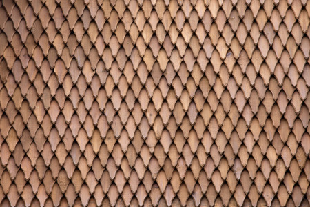 Wood tiles pattern of traditional wooden roof, background, texture