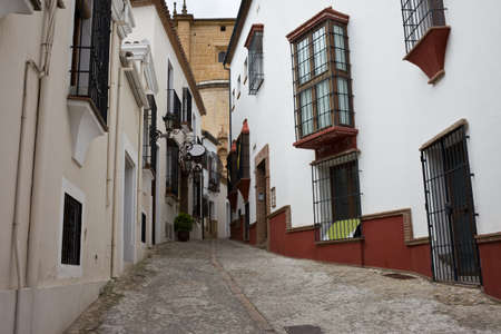 City of Ronda in Andalusia, Spain, houses and narrow street in the Old Townの写真素材
