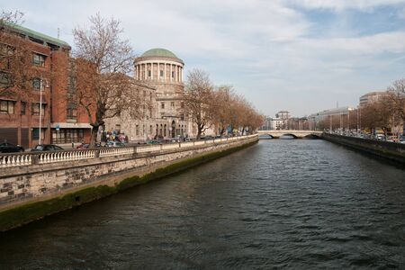 City of Dublin in Ireland, Four Courts, River Liffey waterfrontの写真素材