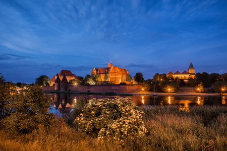 Malbork Castle at night in Poland, Teutonic Knights medieval fortress, UNESCO World Heritage Siteのeditorial素材