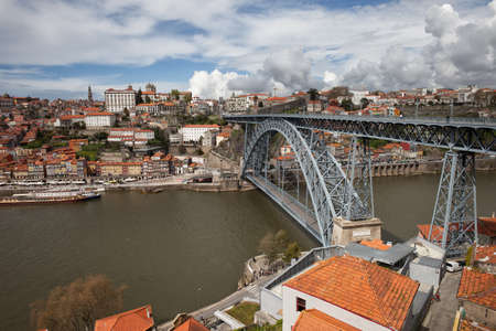 City of Porto cityscape in Portugal, Dom Luiz I Bridge on Douro Riverの写真素材