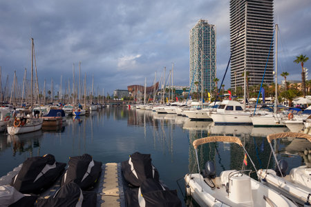Spain, Catalonia, city of Barcelona, sailboats, yachts and motorboats at Port Olimpic marinaのeditorial素材
