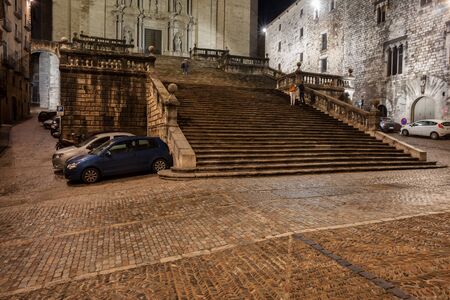 Staircase and square at the Cathedral by night in Girona, Catalonia, Spainの写真素材