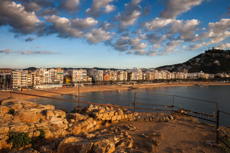 Sunrise from Sa Palomera Rock overlook terrace in Blanes, resort town on Costa Brava in Catalonia,...