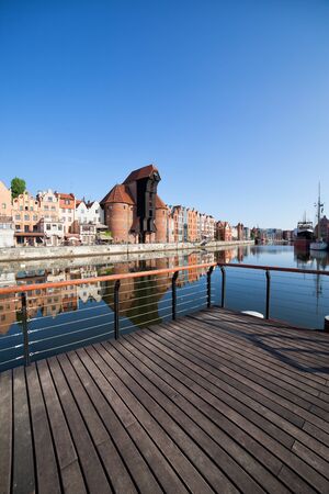 City of Gdansk cityscape in Poland, Old Town skyline from boardwalk at Old Motlawa Riverの写真素材