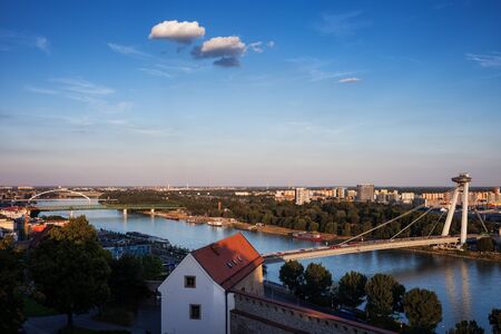 Slovakia, Bratislava skyline, capital city cityscape with Danube river at sunsetの写真素材