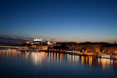 Bratislava capital city skyline from Danube River at night in Slovakiaのeditorial素材