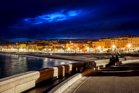 Night city skyline of Nice in France from seaside promenade.の写真素材