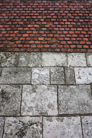 Old wall background with large stone blocks and bricks of Wawel Castle in Krakow, Polandの写真素材