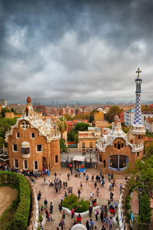 Barcelona, Catalonia, Spain - October 24, 2016: Park Guell pavilions designed by Gaudi, people sightseeing at the famous city landmarkのeditorial素材