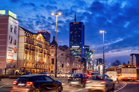 Warsaw, Poland - January 14, 2019: Evening traffic in the capital city center, Aleje Jerozolimskie main street filled with cars, buses, tramのeditorial素材
