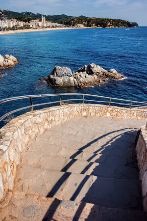 Stairs to the sea in Lloret de Mar, Costa Brava, Catalonia, Spain