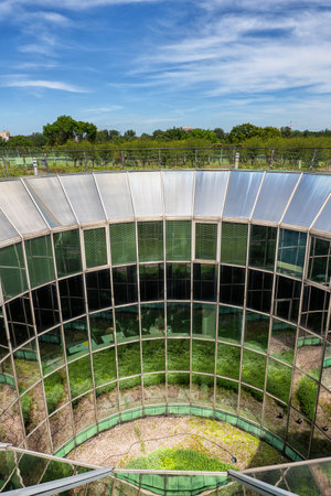 Warsaw, Poland - May 30, 2019: Warsaw University Library building, circular shape glass facade with inner courtyard, view from aboveのeditorial素材
