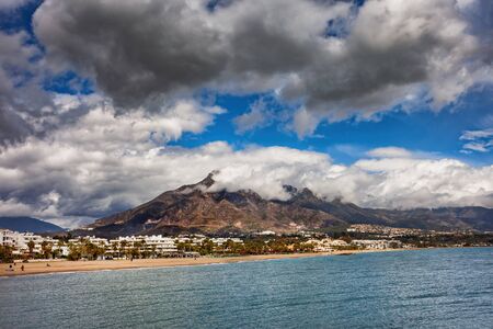 Costa del Sol Spanish coast, sea view to beach and La Concha Mountain in Marbella, Andalusia, Malaga...
