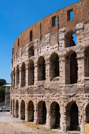 The Colosseum in city of Rome in Italy, ancient Flavian Amphitheatre from 80 AD.の写真素材