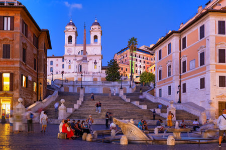 Rome, Lazio, Italy - August 27, 2020: People at the Spanish Steps and Barcaccia Fountain on Piazza di Spagna in the eveningのeditorial素材