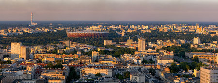 Panorama of Warsaw city in Poland, aerial view panoramic cityscape of the capital city at sunset.のeditorial素材
