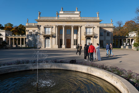 Warsaw, Poland - October 8, 2021: Palace on the Isle and fountain in Royal Lazienki Park, Neoclassical architecture, city landmark.のeditorial素材