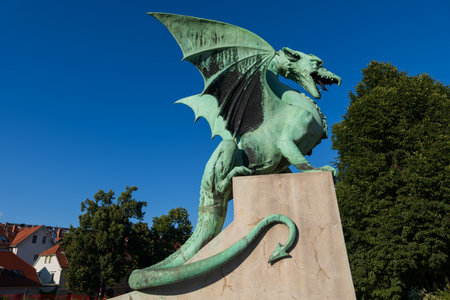 The Dragon statue on the Dragon Bridge in Ljubljana, Slovenia, city landmark.の写真素材