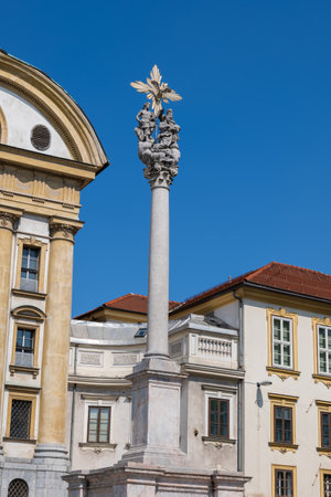 Holy Trinity Column in Ljubljana, Slovenia. Plague column from 1693 with a stone sculpture from 1722 depicting God the Father, Jesus, Mary and Holy Ghost in the form of dove.の写真素材