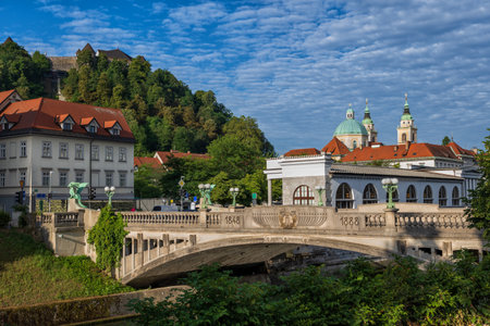 The Dragon Bridge (Slovene: Zmajski most) over Ljubljanica River in city of Ljubljana in Slovenia.の写真素材