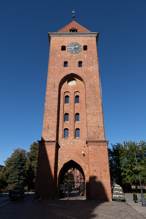 Market Gate (Polish: Brama Targowa) in Elblag, Poland. Medieval Gothic landmark from the 14th century, part of the old city walls defensive fortification.の写真素材