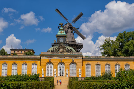 Potsdam, Germany - August 6, 2021: Sanssouci Park, the New Chambers (Neue Kammern), ensemble of Sanssouci Palace and historical mill in the background.のeditorial素材
