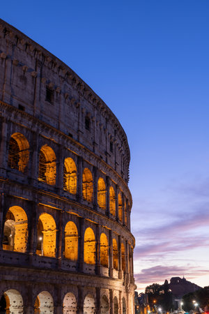 Evening at the Colosseum in city of Rome in Italy, ancient Flavian Amphitheatre and Gladiators stadium.の写真素材