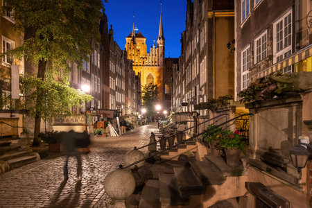 Poland, Gdansk, Mariacka Street in Old Town at night with view to St. Mary Churchの写真素材