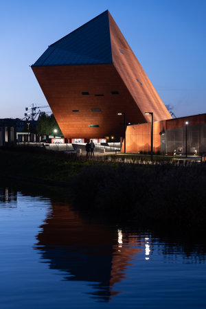 Gdansk, Poland - October 9, 2022 - Museum of the Second World War in the evening with reflection in...