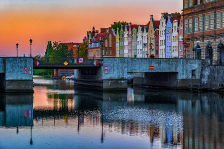 City of Gdansk at sunrise in Poland, Green Bridge on Motlawa river to the Old Town.の写真素材