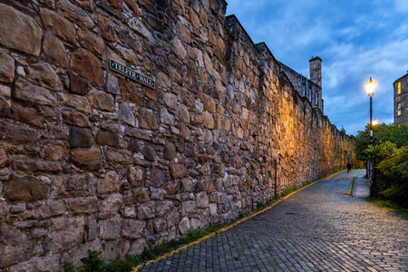 The Telfer Wall at dusk in city of Edinburgh in Scotland, historic defensive stone wall in the Old Town.の写真素材