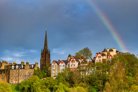 City of Edinburgh Old Town skyline with Ramsay Garden houses, The Hub tower and rainbow in the sky in Scotland, UK.の写真素材